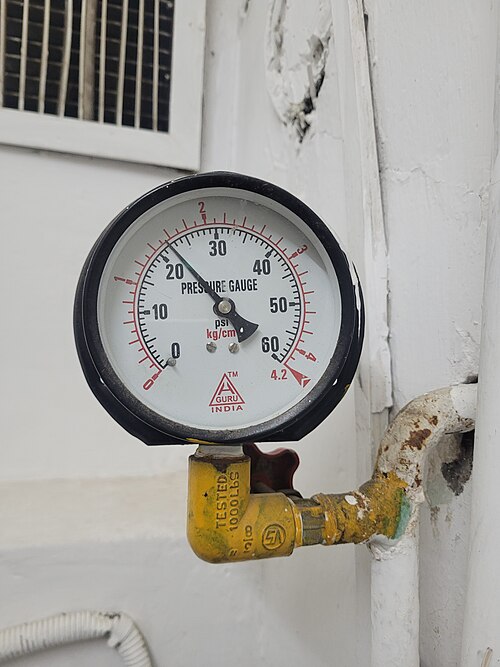 Generic analog pressure gauge with PSI markings; not installed on a pool filter